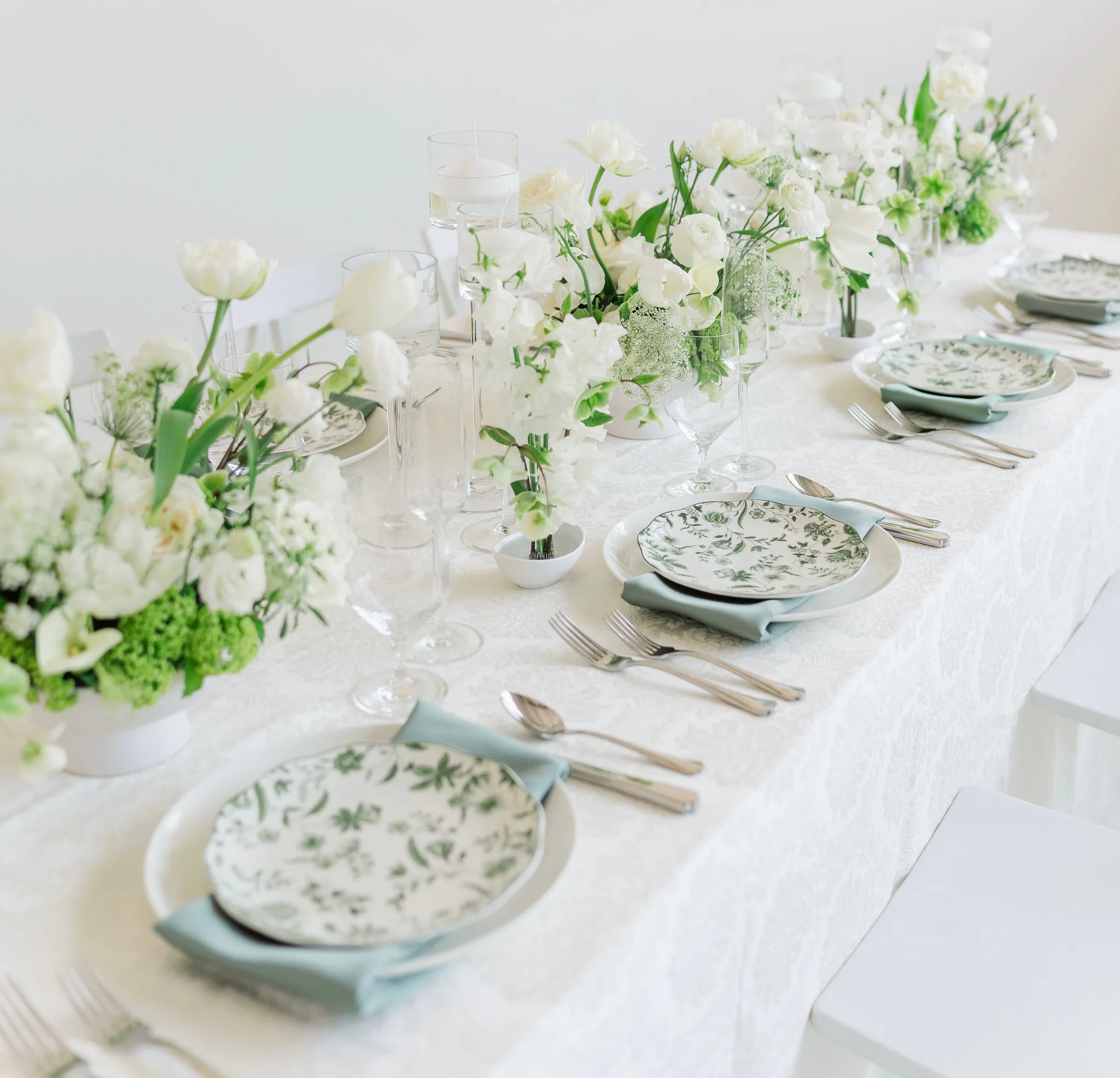 White and chartreuse flower tablescape at Realm Denver