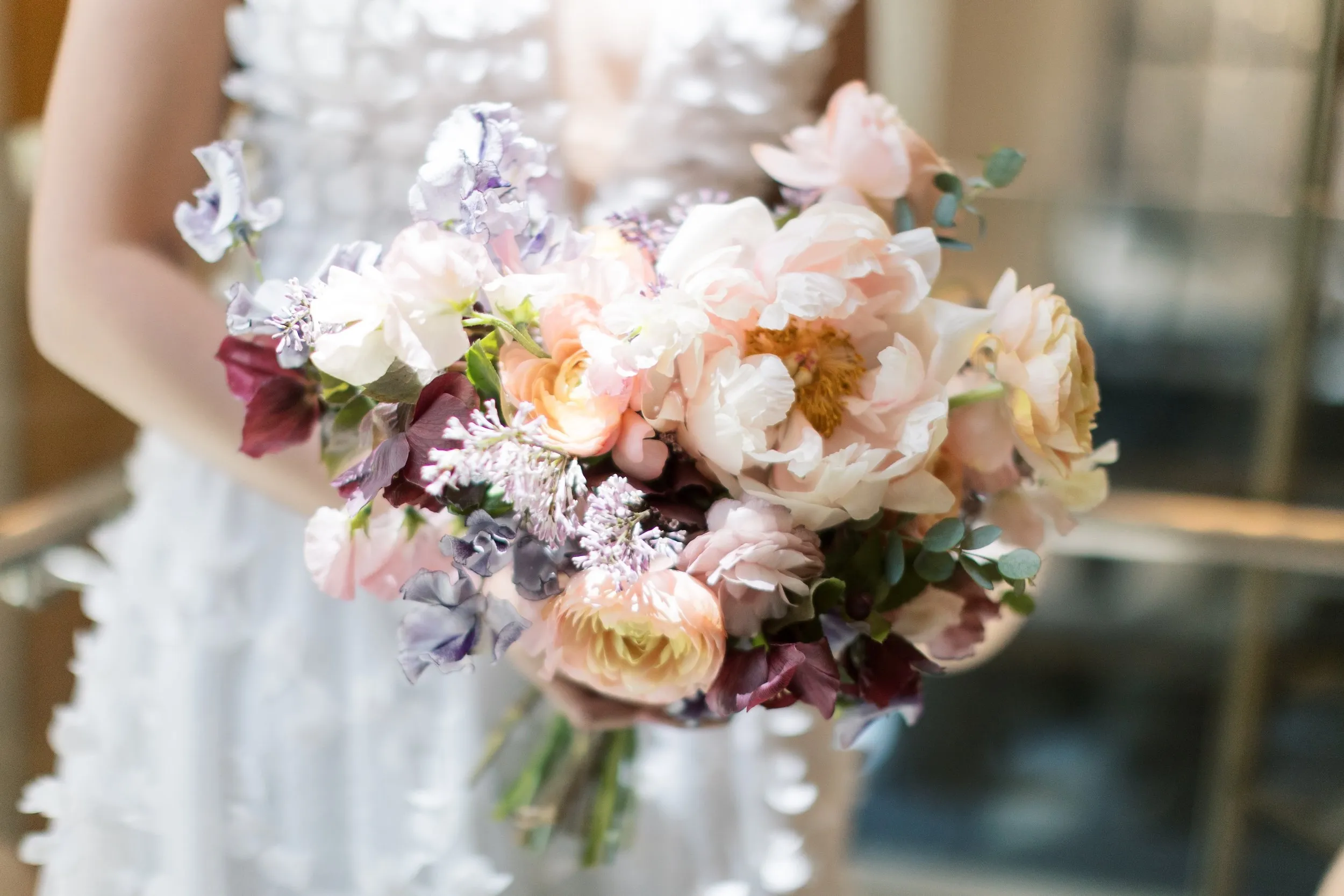 Elegant Denver wedding flowers at The Four Seasons with bridal bouquet