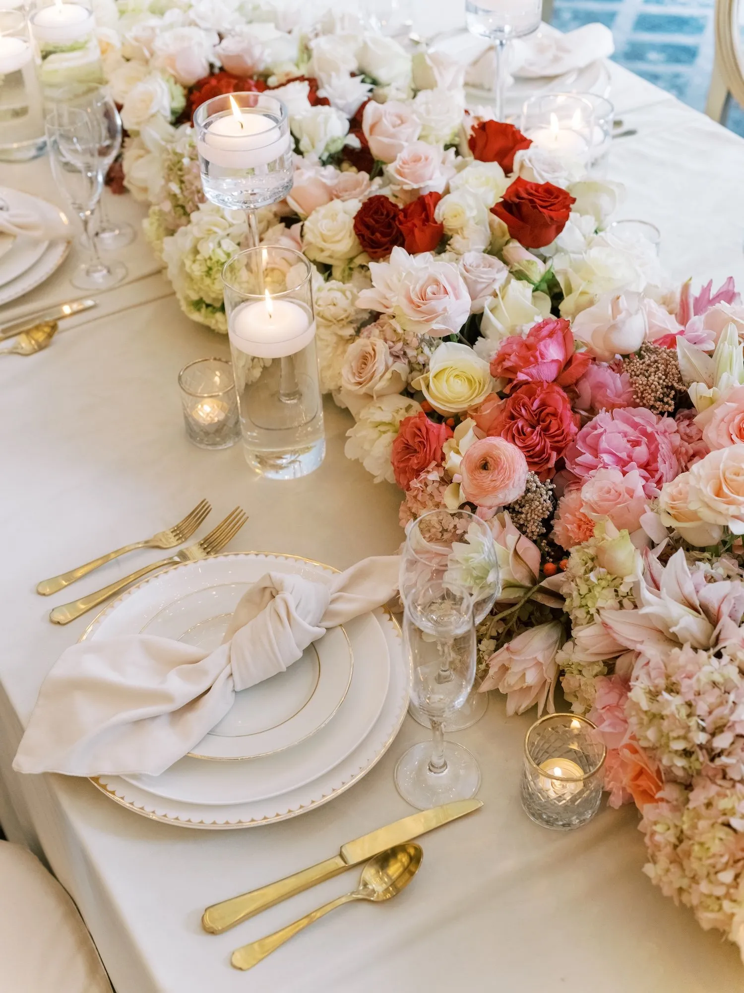Crimson and blush floral centerpiece detail