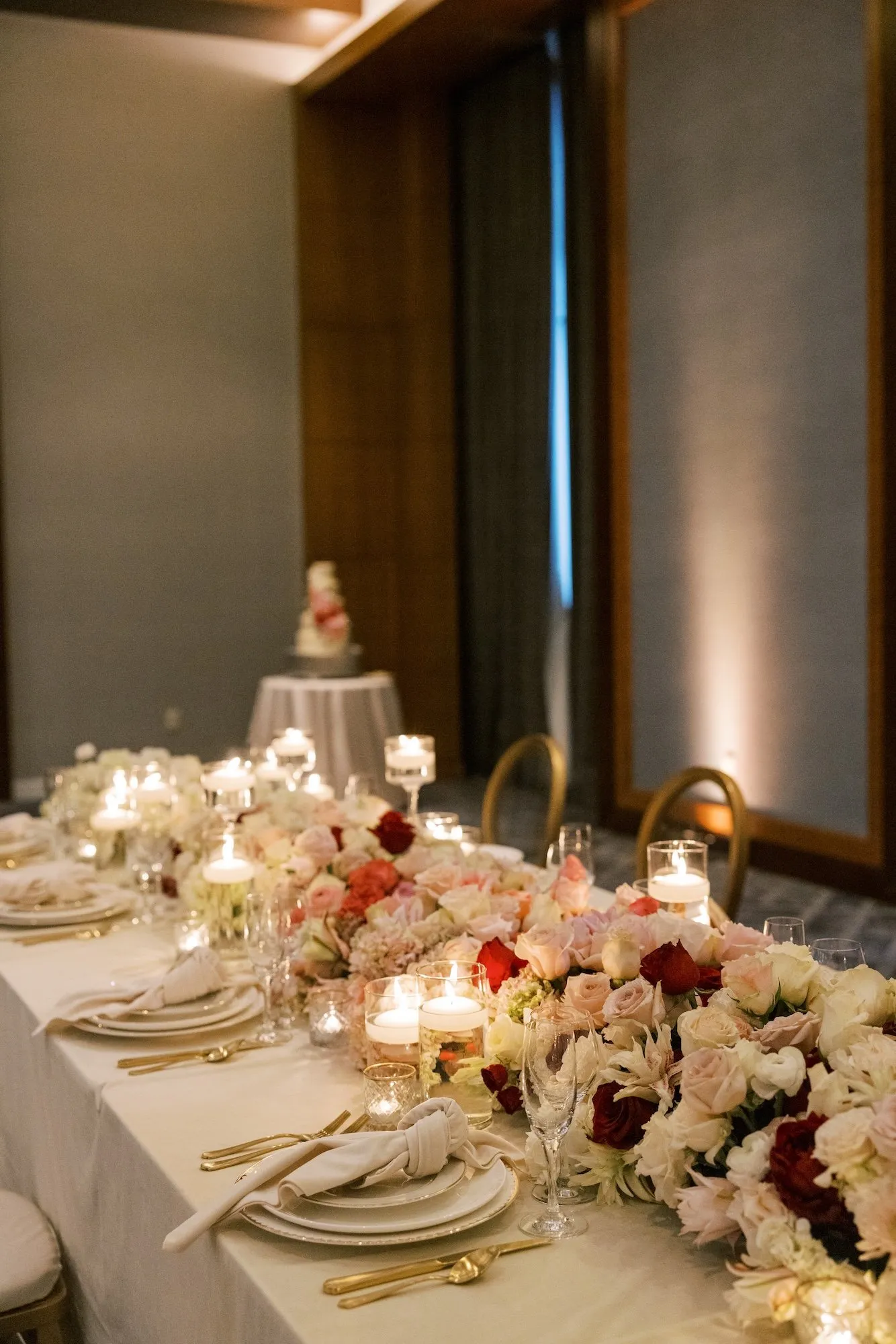 Candlelight and deep red roses at The Four Seasons