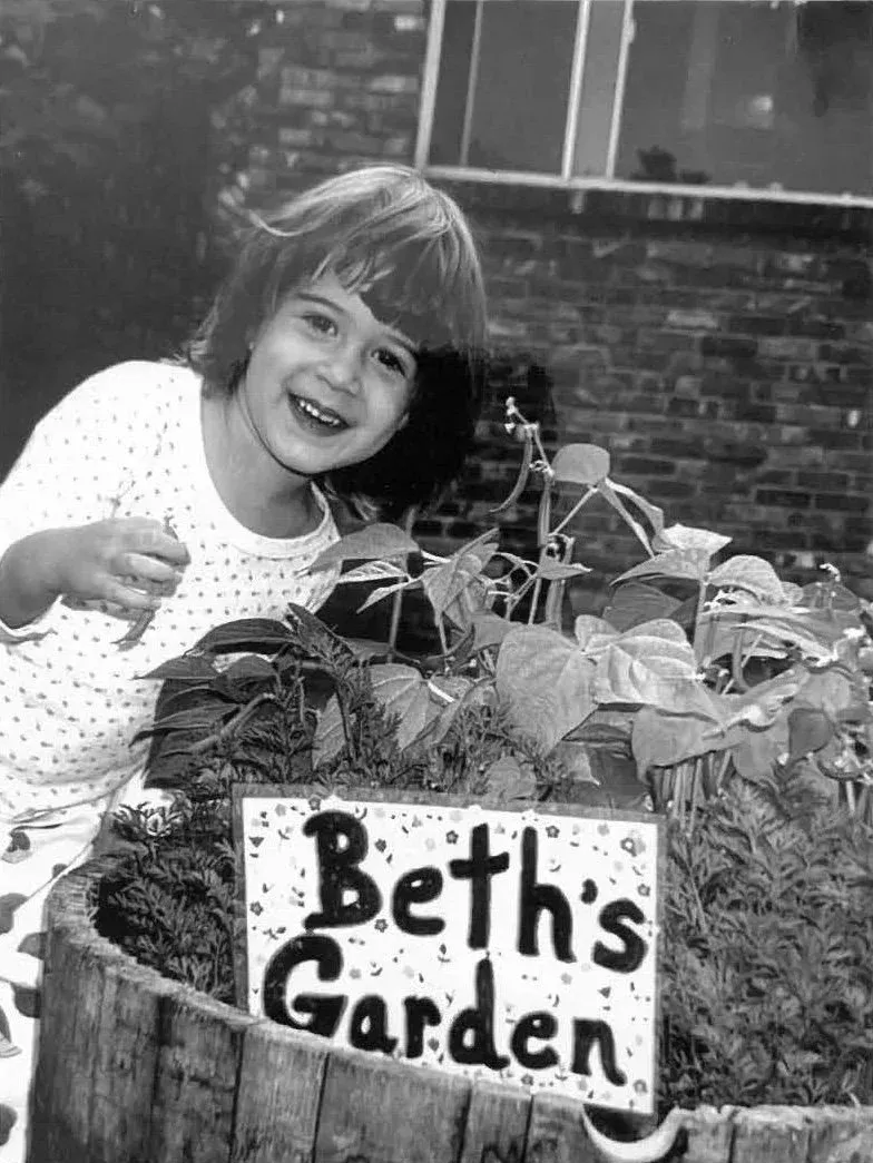 Elizabeth as a child in her mother's garden