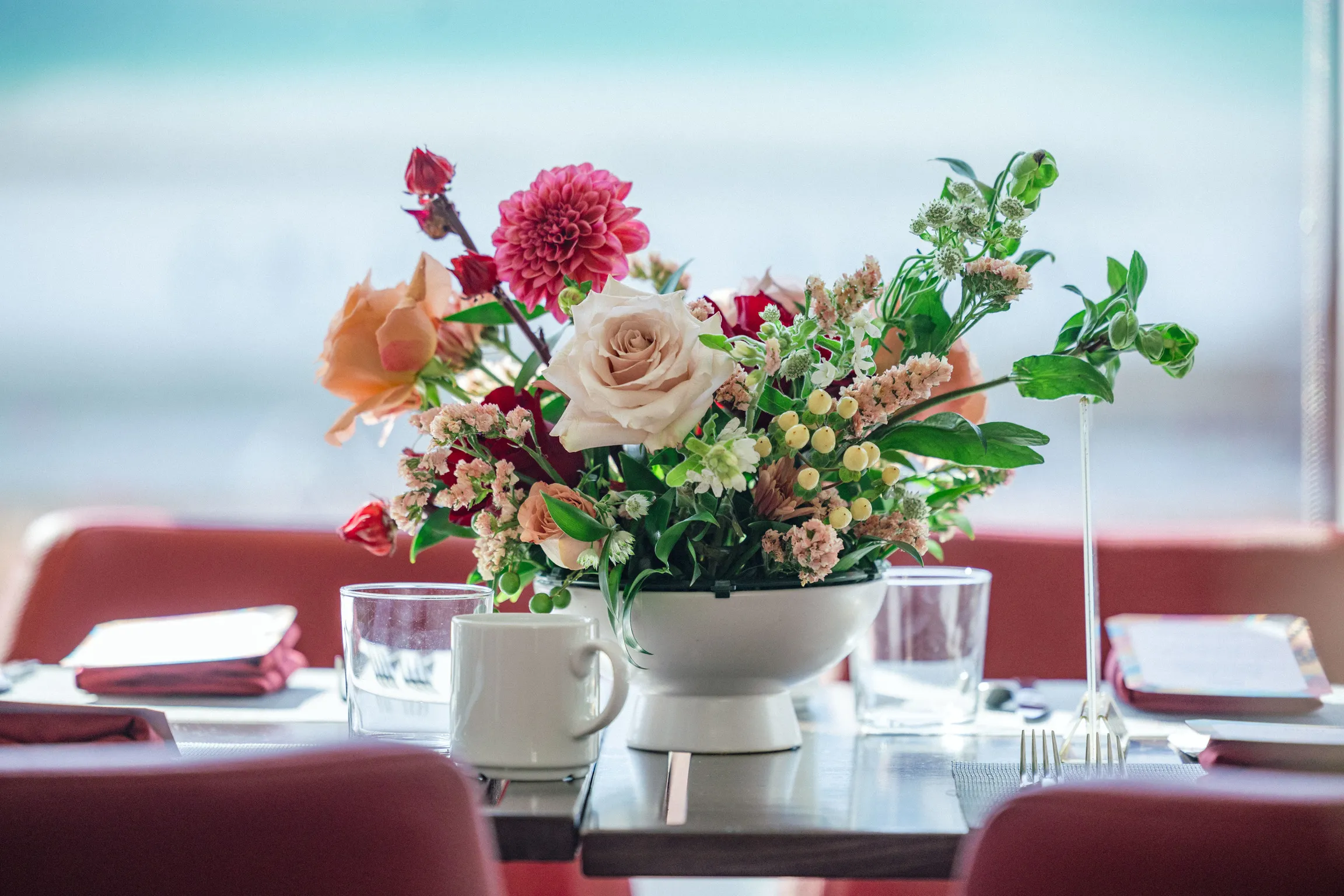 Colorful rose floral centerpiece for office décor