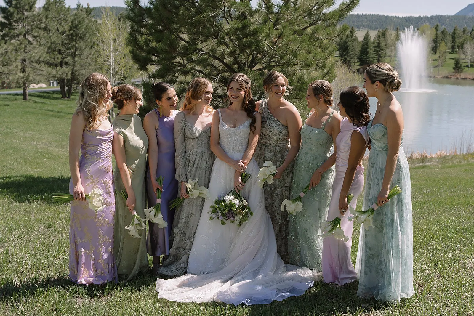 Bride and groom at Spruce Mountain Ranch with mountain backdrop